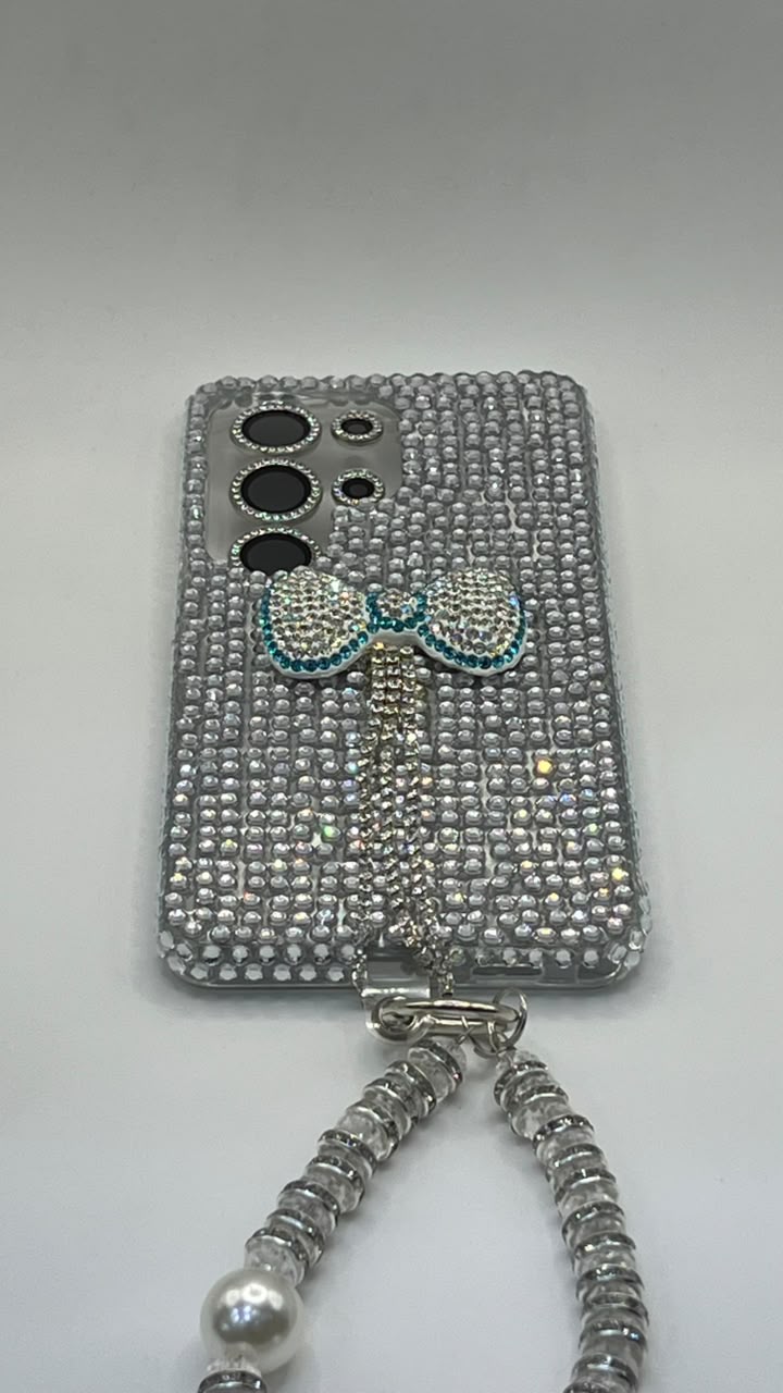 بوشيط آيفون فاخر مزين بأحجار لامعة مع سوار يد أنيق(SAMSUNG S26 ULTRA)